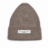 A ribbed knit beanie hat in taupe brown with a white brand label reading 'slopes&town Amsterdam' on the front cuff, shown against a plain white background.