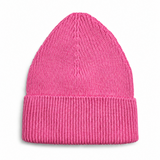 A bright pink knit merino wool beanie hat with a folded cuff
