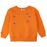 An orange crewneck sweatshirt featuring small embroidered blue bicycle motifs on the chest, displayed flat against a solid white background.