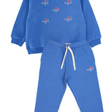 Slopes and Town Kids blue organic cotton tracksuit with embroidered airplane design