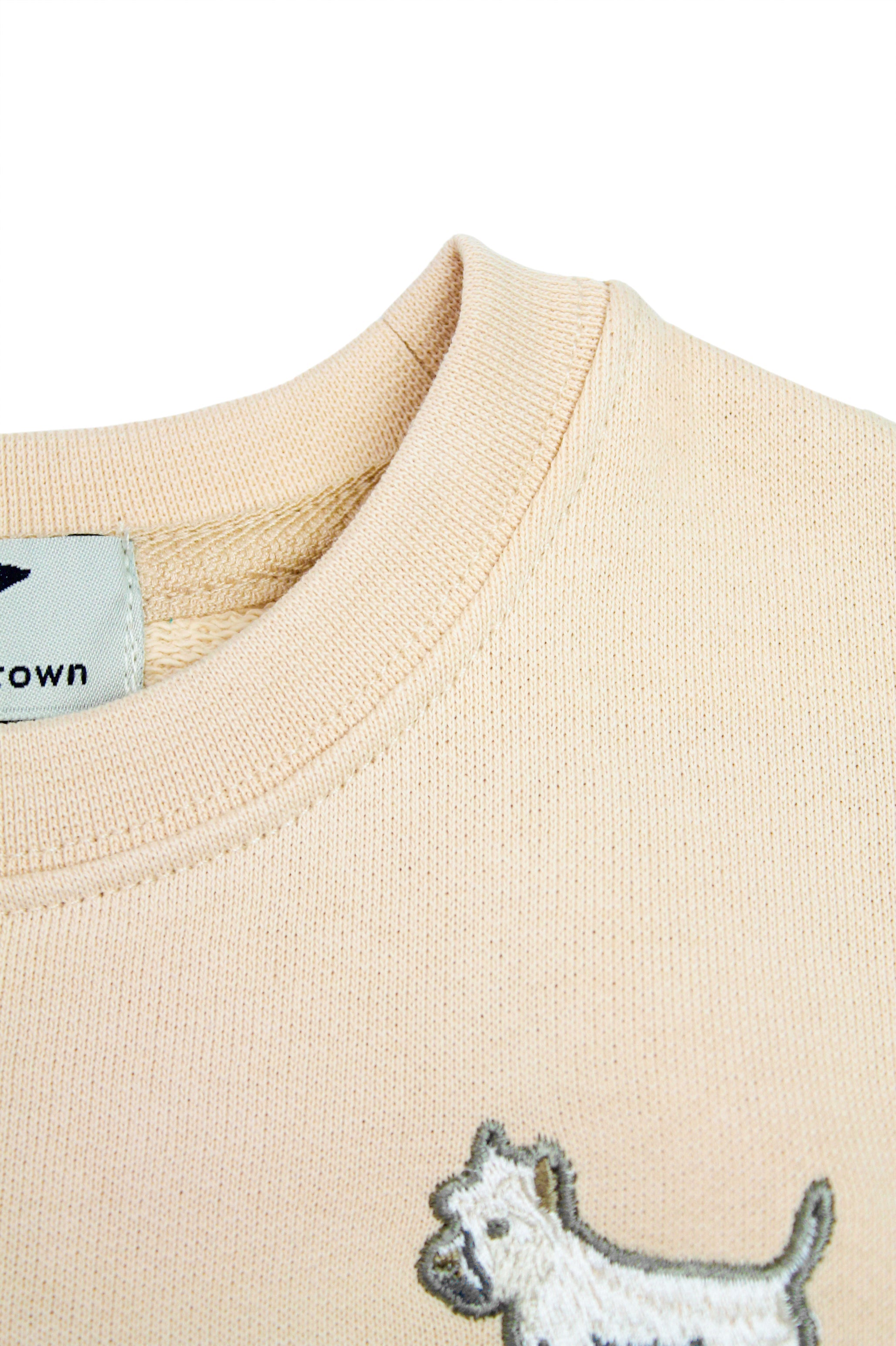Beige organic cotton tracksuit with white puppy design