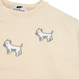 Kids' cream tracksuit featuring embroidered white terrier dog
