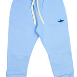 Blue kids’ tracksuit bottoms with embroidered shark design