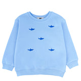 Kids' light blue organic cotton sweatshirt with embroidered shark design, front view