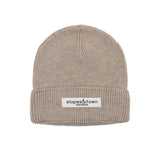 Kids merino wool beanie in beige, front view with Slopes and Town Amsterdam woven label