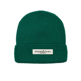 Kids merino wool beanie in pine green, front view with Slopes and Town Amsterdam woven label