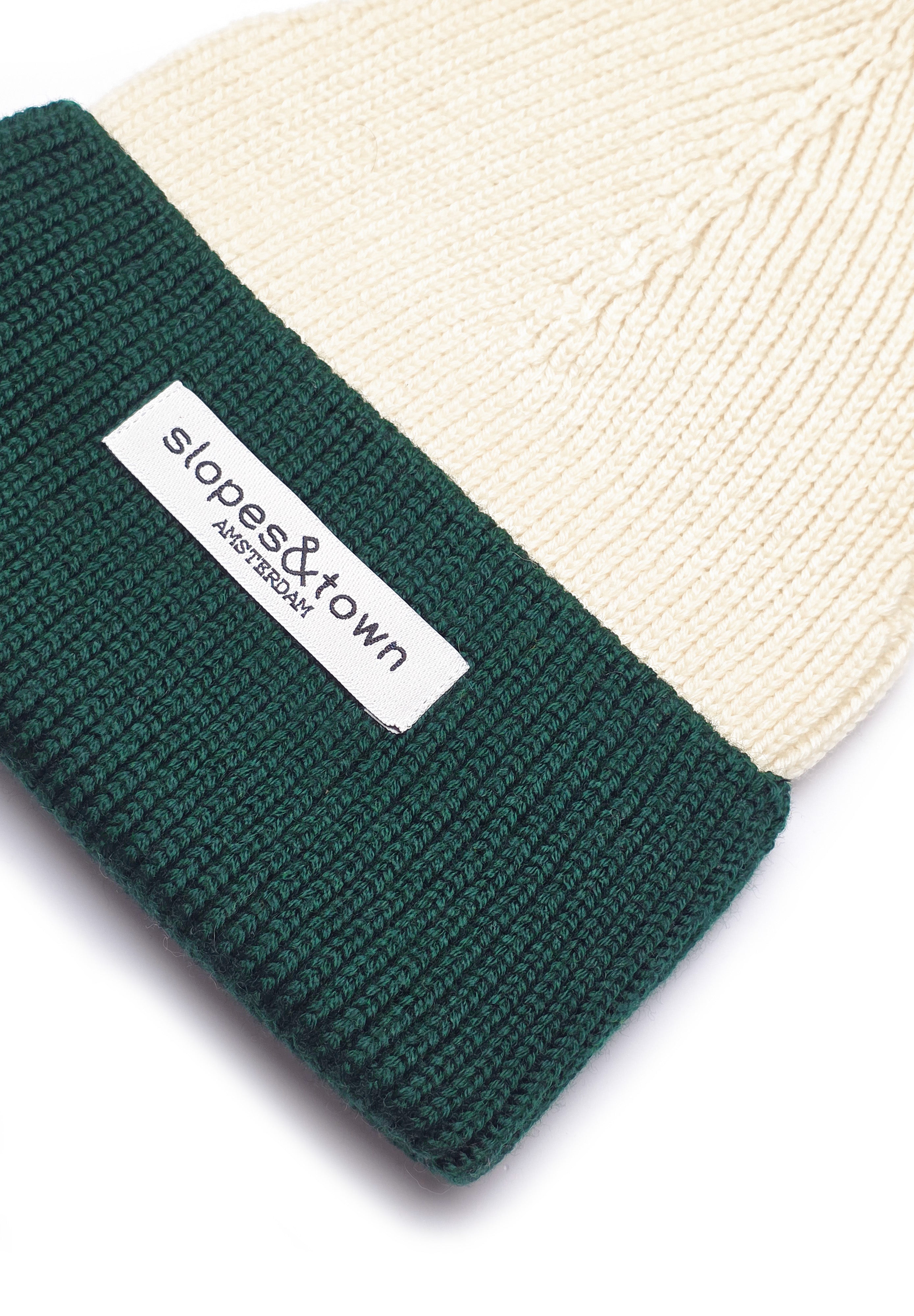 Fine merino wool knit detail on a green kids beanie