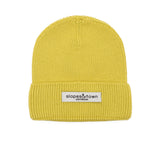 Kids merino wool beanie in yellow, front view with Slopes & Town Amsterdam woven label
