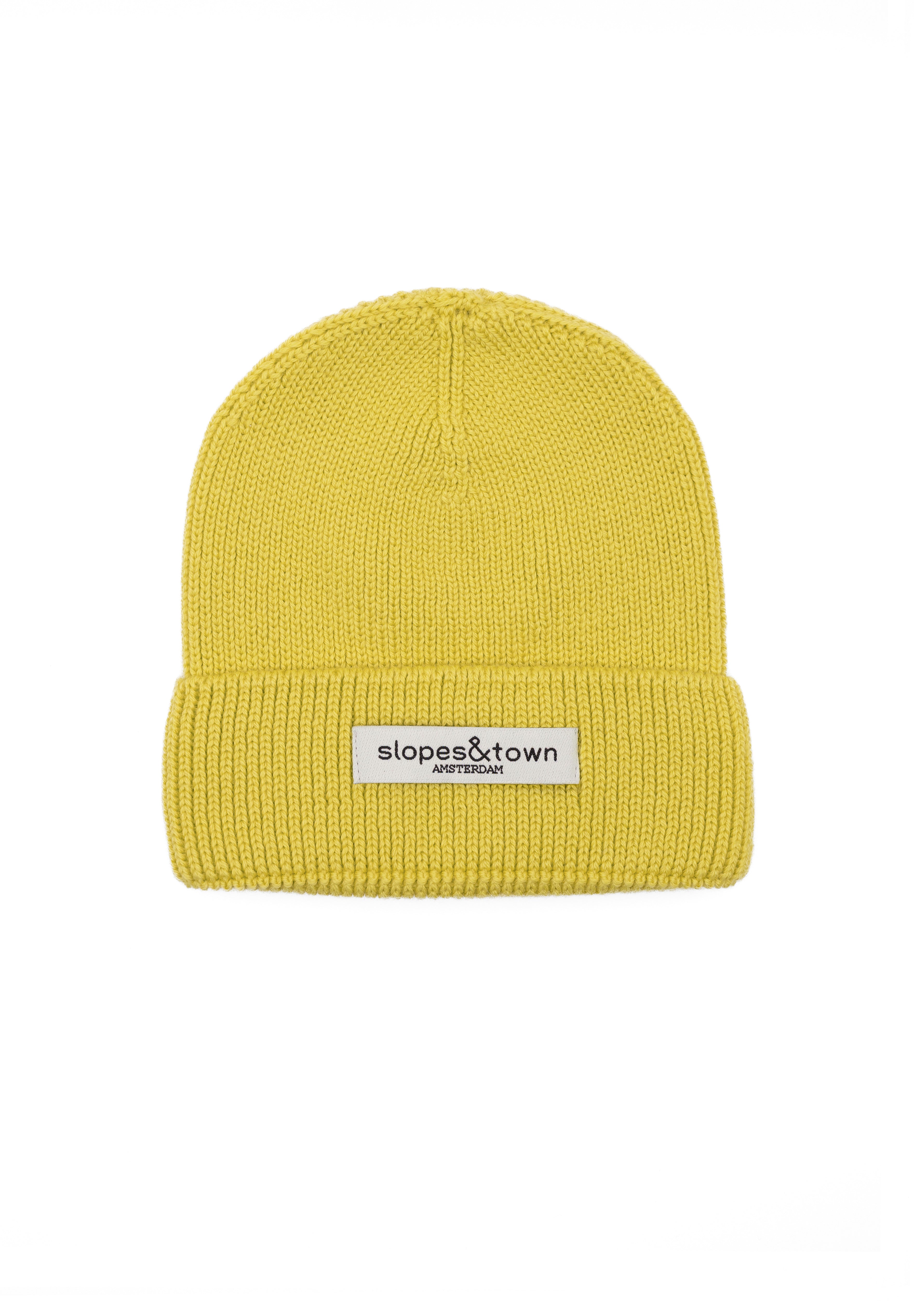 Kids merino wool beanie in yellow, front view with Slopes & Town Amsterdam woven label