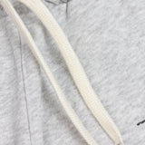 Red gondola ski lift design on grey kids' tracksuit