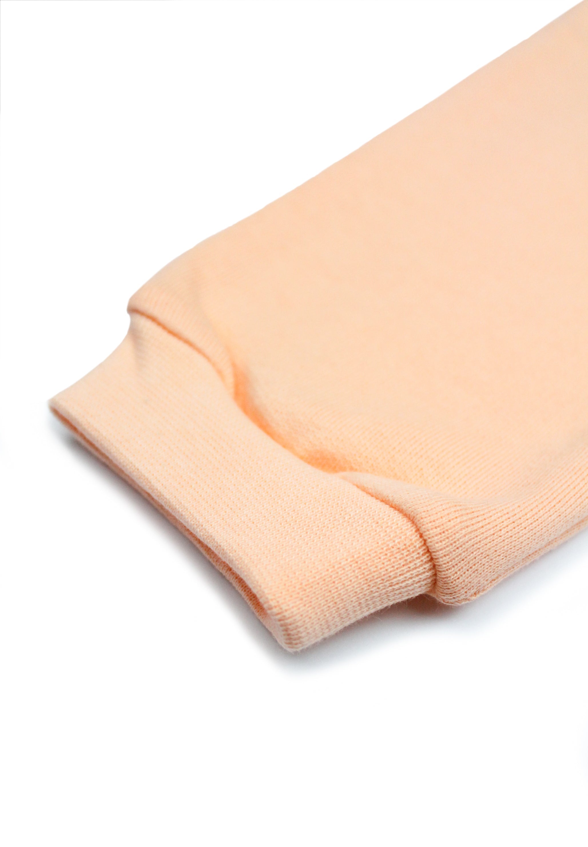 Kids' peach joggers with sausage dog embroidery