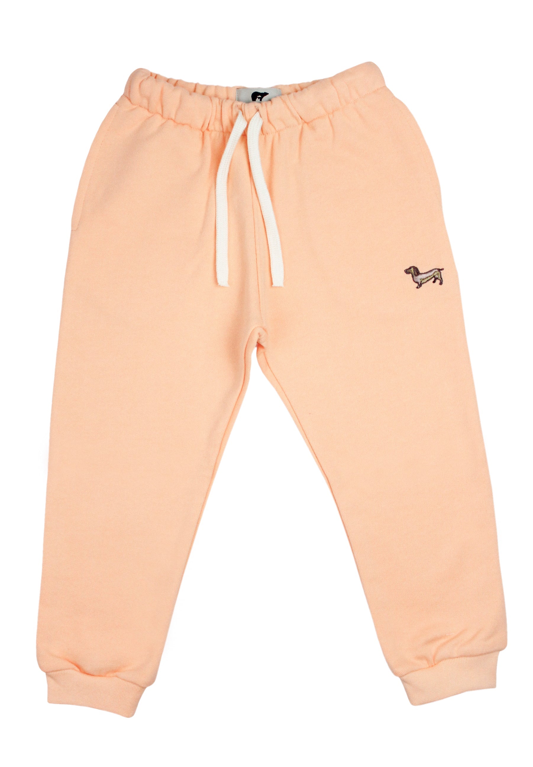 Slopes and Town Kids peach organic cotton sweatpants with embroidered sausage dog design