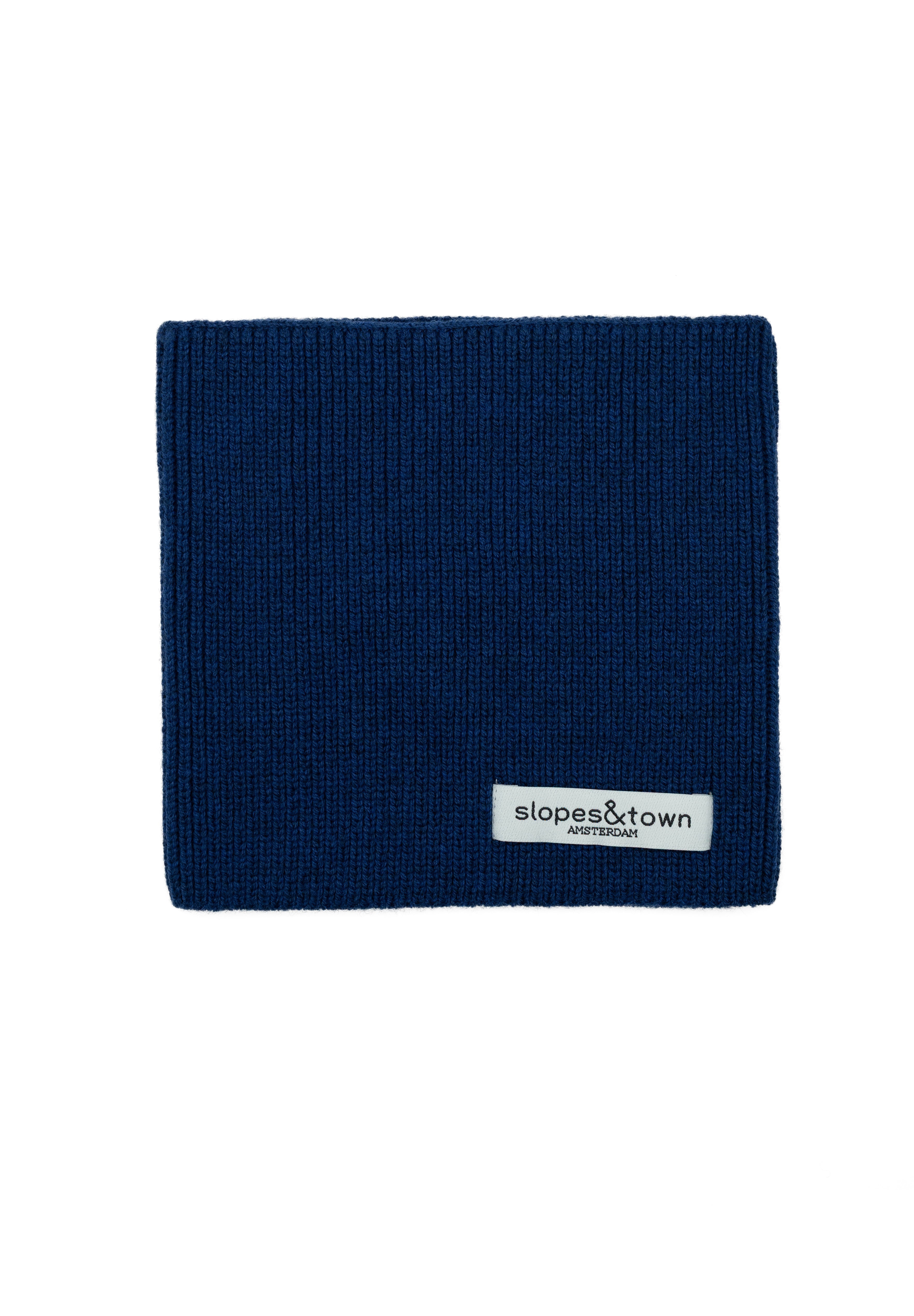 Kids merino wool snood in navy blue, front view with Slopes and Town Amsterdam woven label