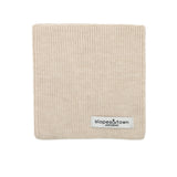 kids merino wool snood in latte beige, front view with Slopes and Town Amsterdam woven label