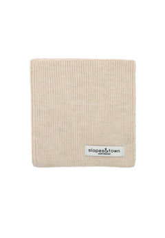 kids merino wool snood in latte beige, front view with Slopes and Town Amsterdam woven label