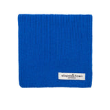 Kids merino wool snood in electric blue, front view with Slopes and Town Amsterdam woven label