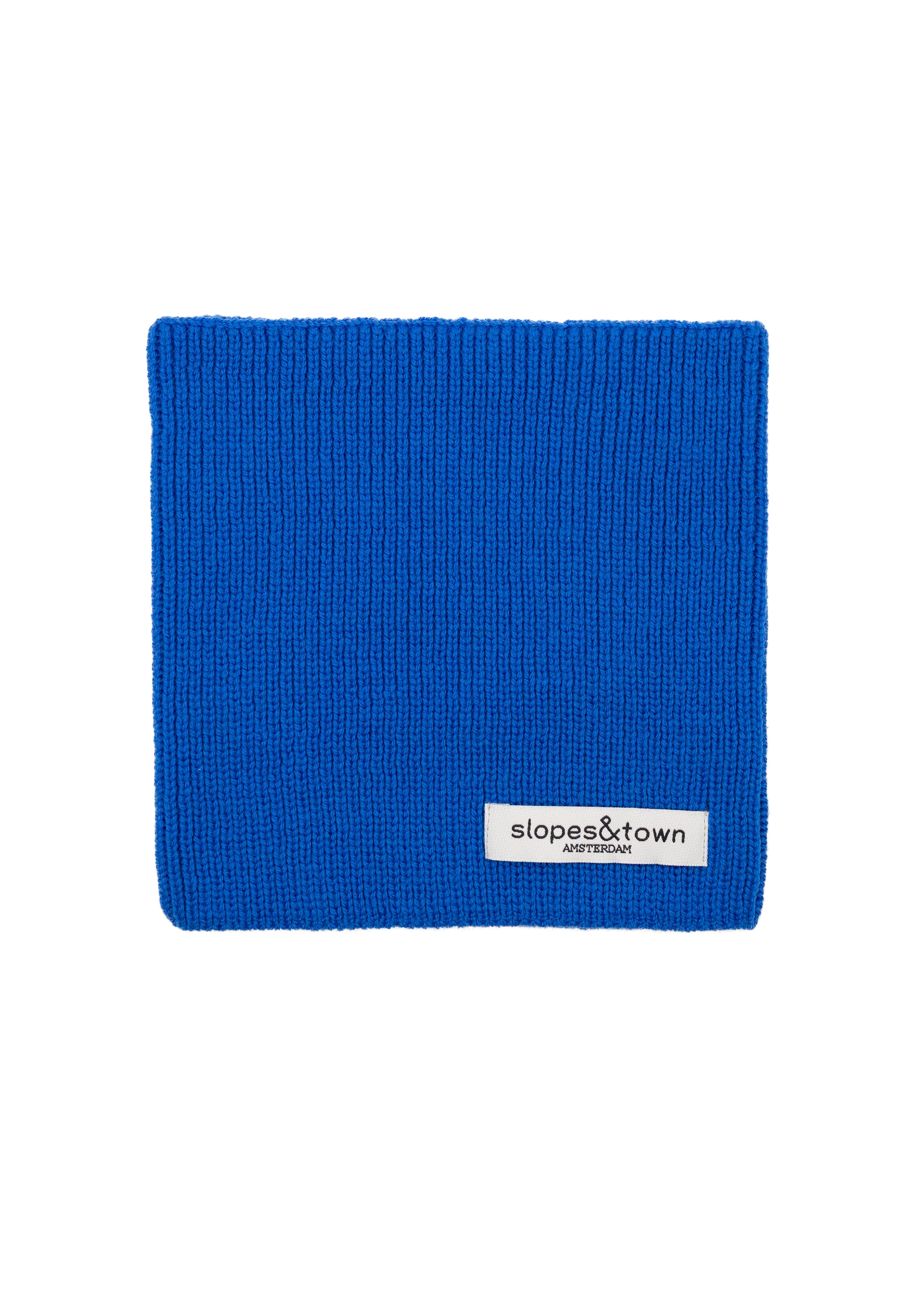 Kids merino wool snood in electric blue, front view with Slopes and Town Amsterdam woven label
