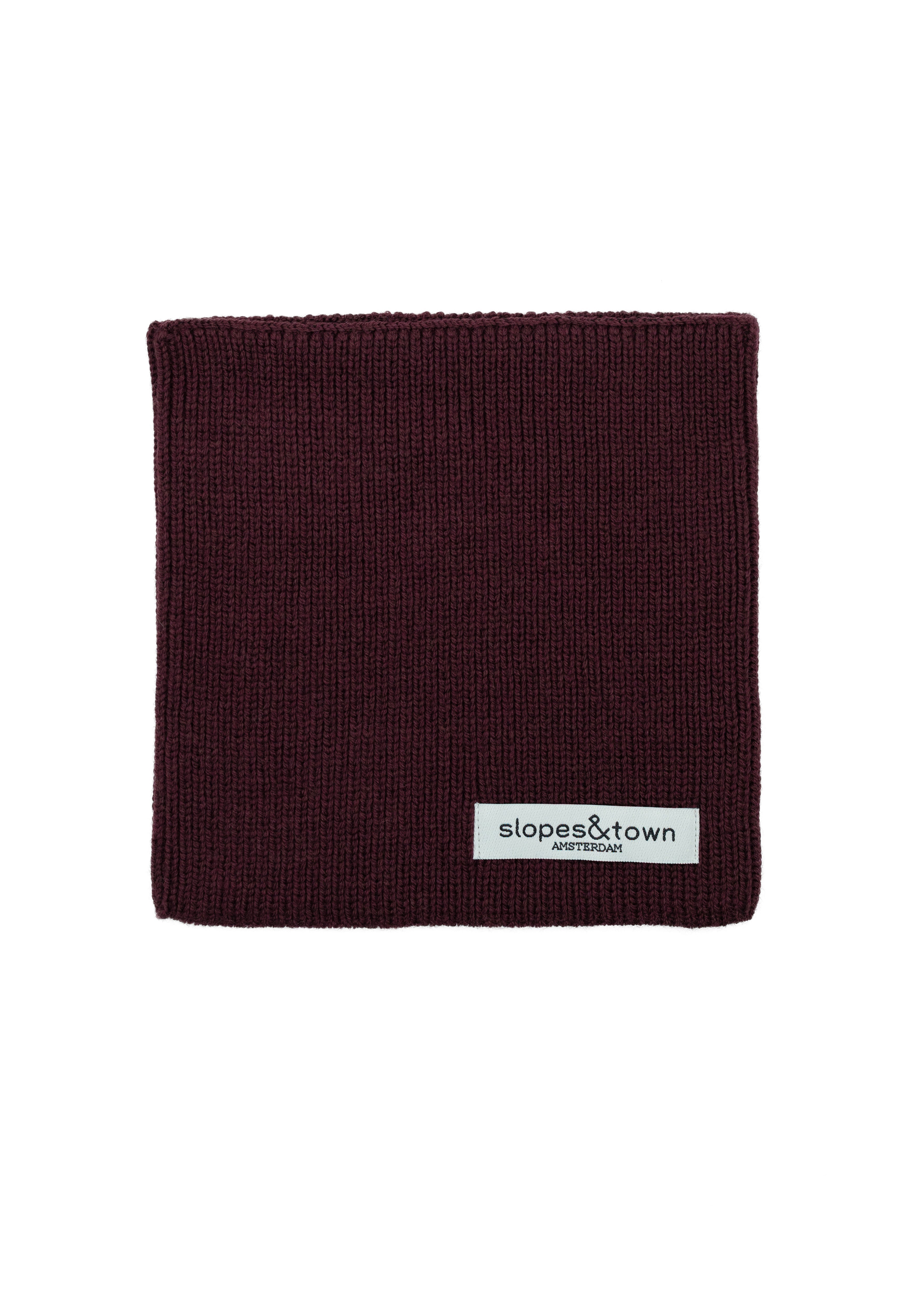 Kids merino wool snood in burgundy, front view with Slopes and Town Amsterdam woven label