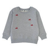 A heather gray long-sleeve crewneck sweatshirt featuring small embroidered red vespa on the front, displayed against a solid white background.
